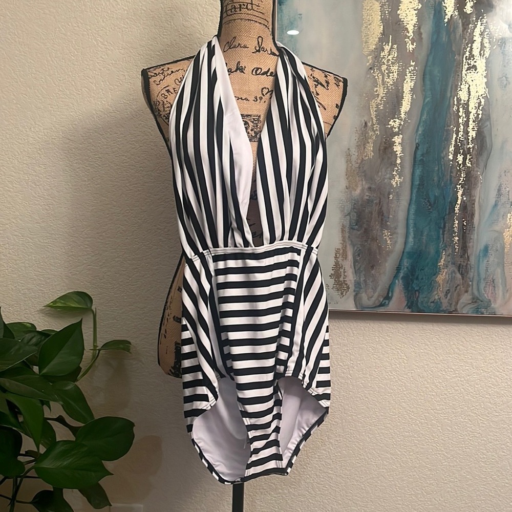 NWT Cocoship Swim Suite 
82% Nylon, 18% Elastane
Care Instructions
Hand Wash On - Picture 8 of 8